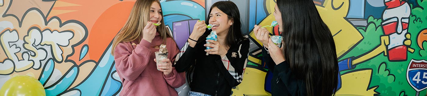 friends enjooying ice cream at jeremia's ice cream shop
